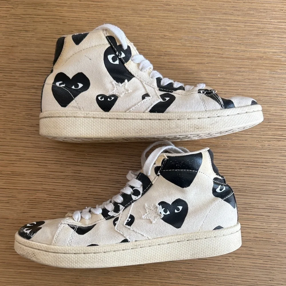 Comme des Garcons PLAY size us
